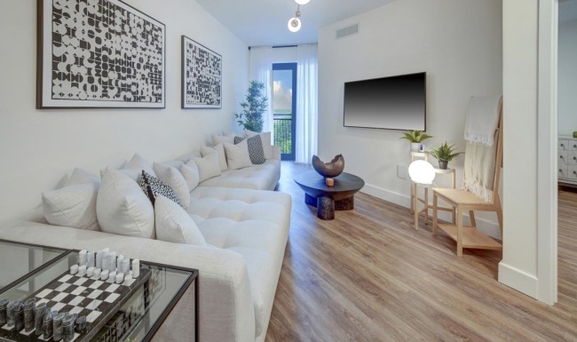 a living room with a white couch