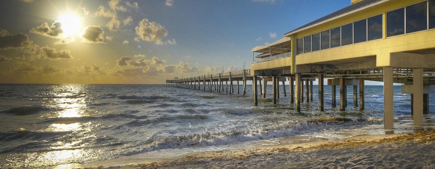 a pier with a building on it